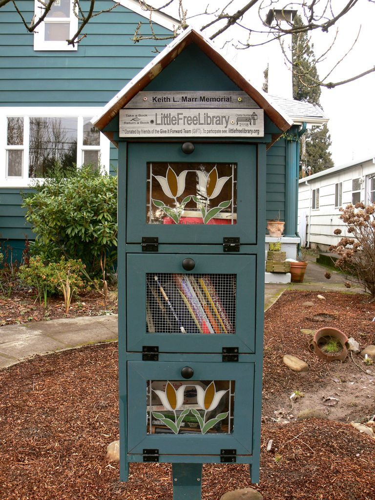 A Little Free Library in Portland, OR, photographed by Rioter Jill Guccini