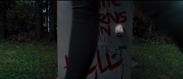 Carrie 2013 sue walking in front of grave