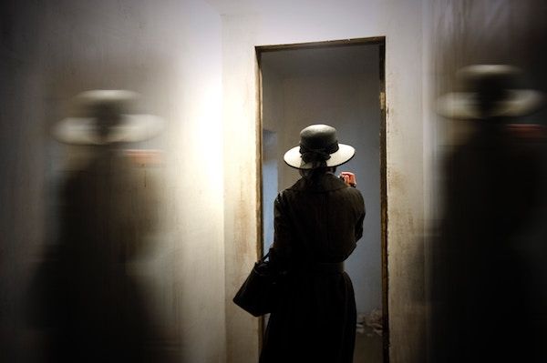 photo of woman in hat by Monica Silva