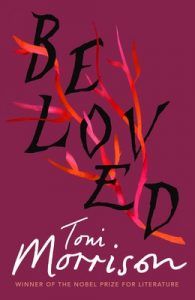 Cover of Beloved by Toni Morrison. A tree branch is juxtaposed against the letters of the title. 