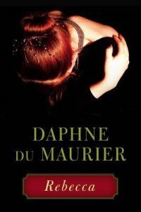 Cover of Rebecca by Daphne du Maurier. There is a woman with red hair looking down. Everything around her is black.