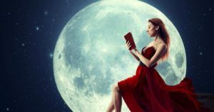 woman reading in front of moon feature 470x248