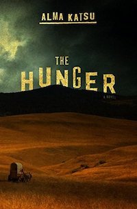 cover of the hunger by alma katsu, featuring image of small wagon rolling through barren brown field and ominous green skies