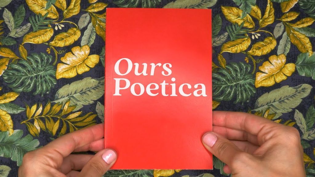 Hands holding a book titled Ours Poetica