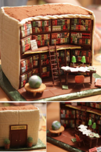 An elaborately decorated cake made to look like a library, which includes books, a ladder, a desk, and decorations.