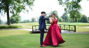 teen couple dancing for prom photo