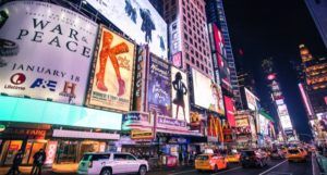 image of New York's Theater District https://unsplash.com/photos/N6t14kV_X68