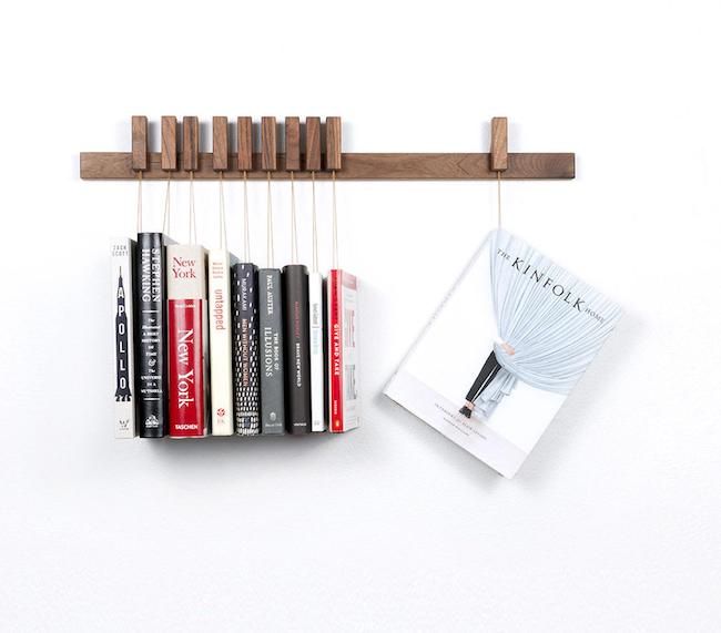 Walnut book rack with cookbooks suspended