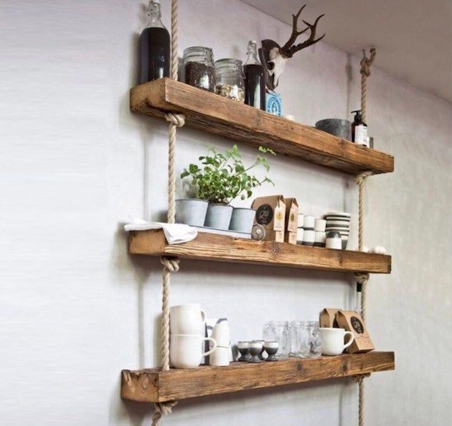 Three wooden hanging shelves