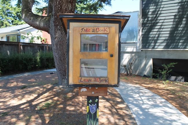 Fernwood Little Free Library painted with "Take a book, leave a book"