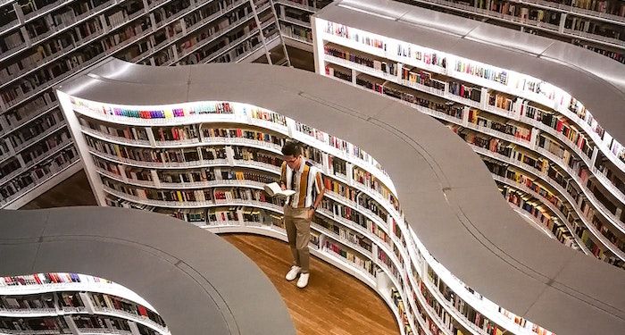 Man standing in bookstore