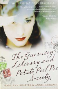 Book cover for The Guernsey Literary and Potato Peel Pie Society, showing a woman with red lipstick, her face slightly obscured by a hat. There are postmarks to the left and right of the book's title beneath her face.