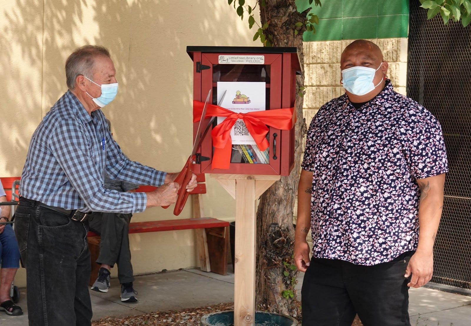 Image of Ribbon Cutting, provided by Little Free Library. 