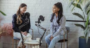 two women recording audio