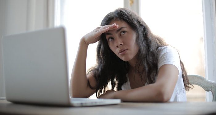 annoyed woman on laptop