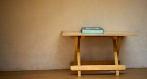 Image of a big book on a wooden table