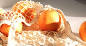 oranges inside a reusable grocery bag