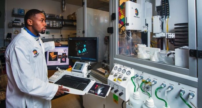 image: a man in a lab coat in a lab