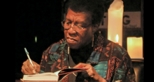 Octavia Butler signing a book