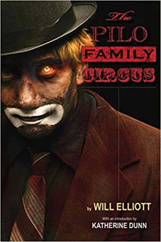 cover of The Pilo Family Circus by Will Elliott, painting of an evil Emmett Kelly clown with glowing yellow eyes