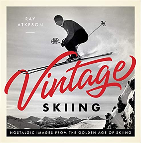 cover of Vintage Skiing: Nostalgic Images from the Golden Age of Skiing by Ray Atkeson; black and white photo of skier mid-jump from the 1940s or 50s