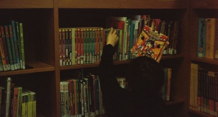 kid shelving book