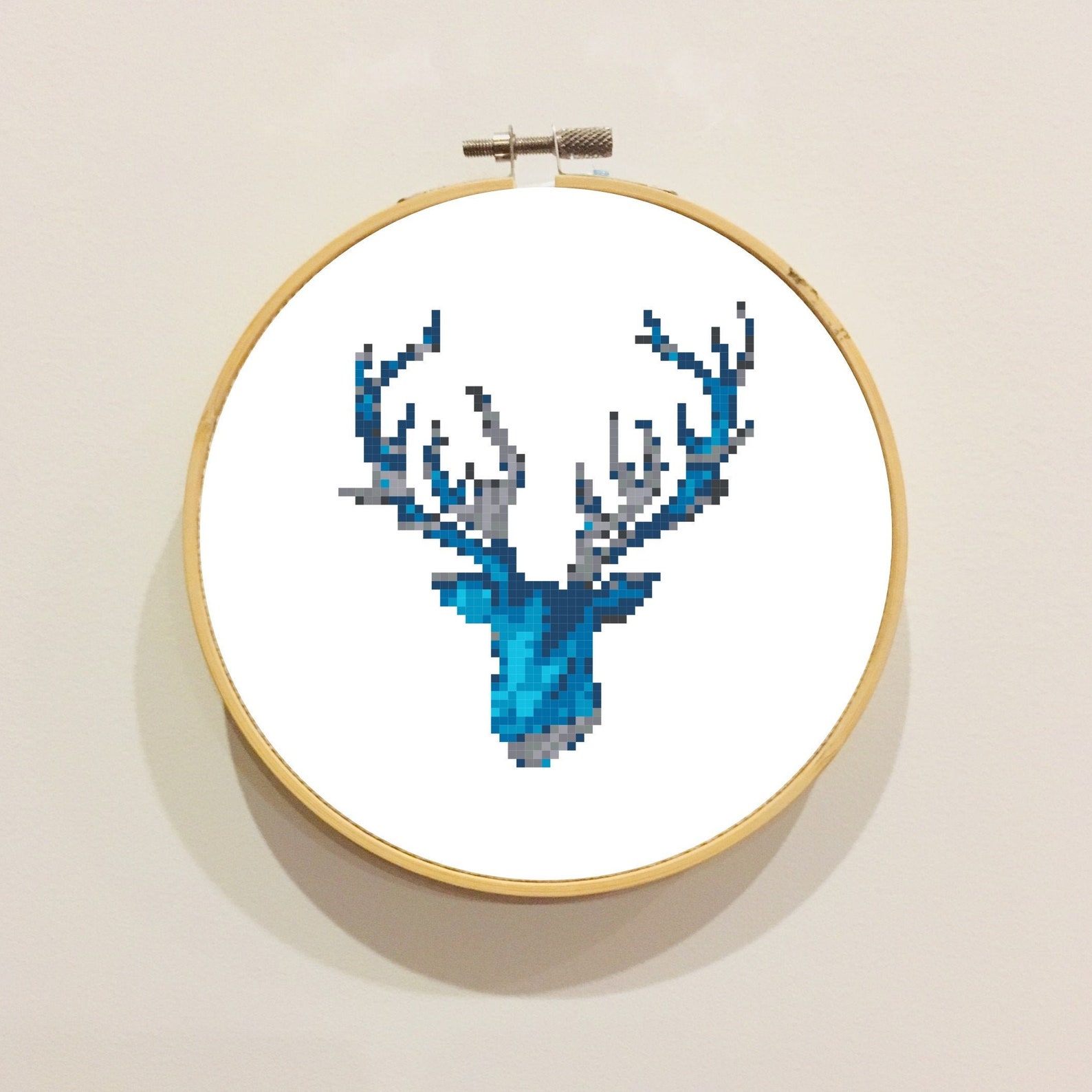 circular hoop of a cross stitch stag