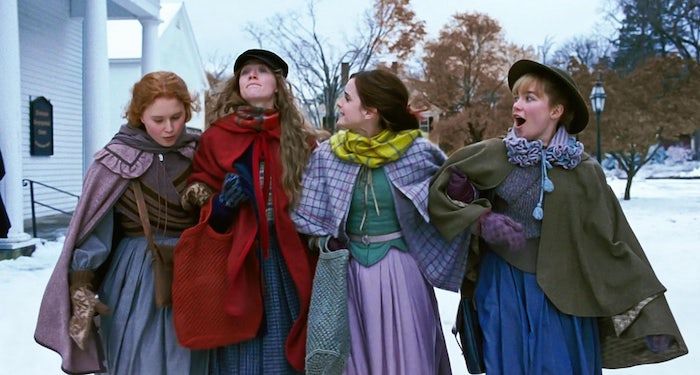 still from Little Women (2019) of the sisters walking together and laughing