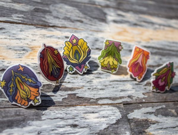Vulva flower acrylic pins by Claudia Rinofner aka polterink