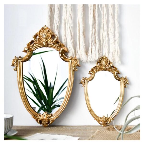 Two golden mirrors of different sizes
