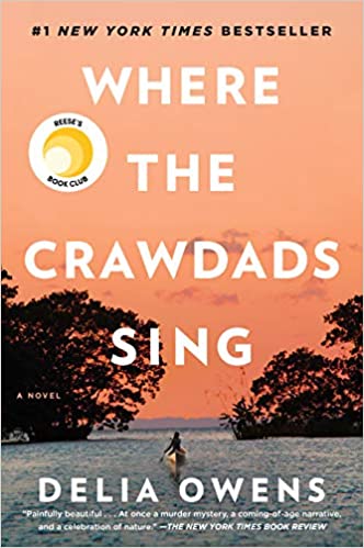 cover of Where the Crawdads Sing by Delia Owens, photo of person in a canoe on a river under an orange dusk sky