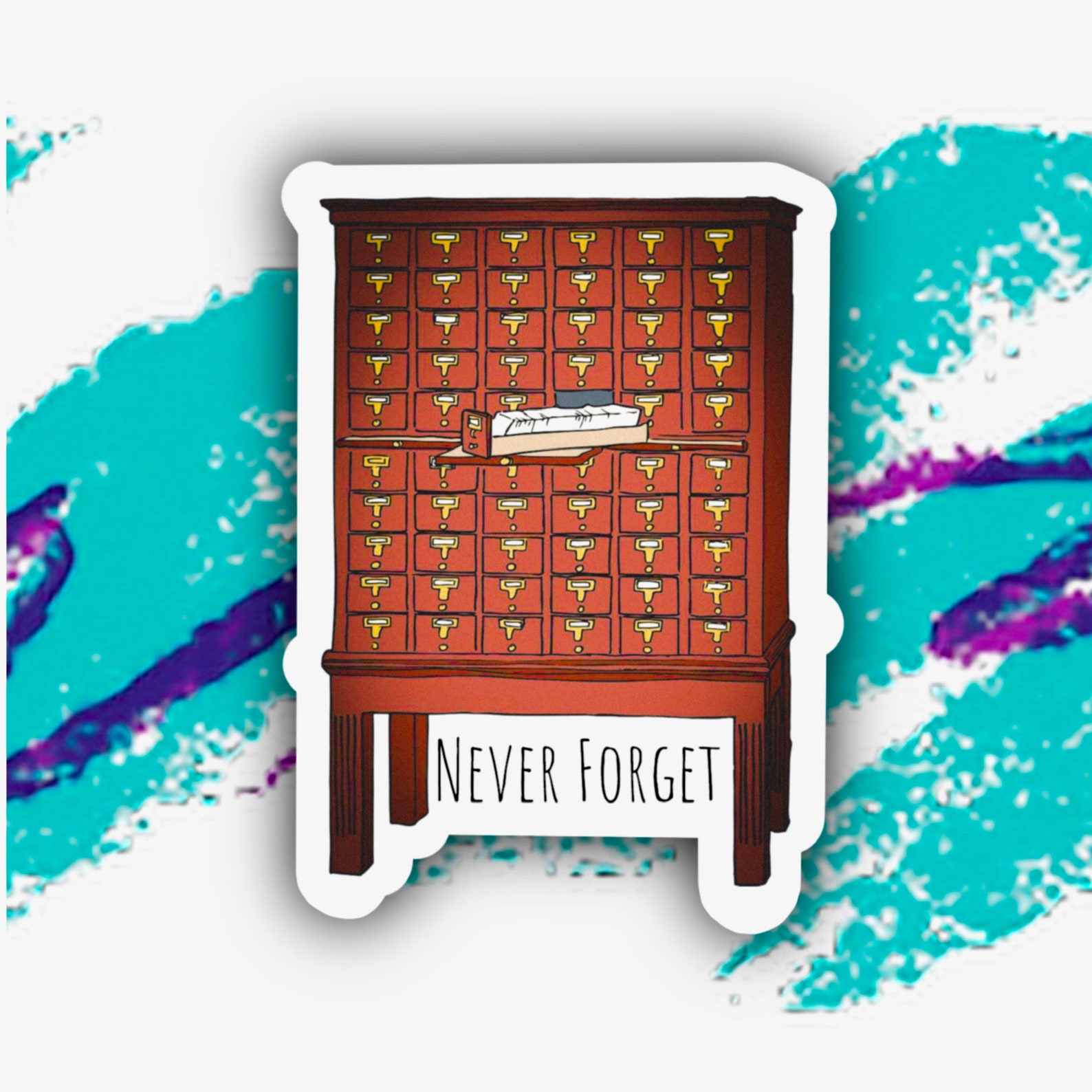 Image of a tall brown library card catalog with the words "never forget" beneath. 