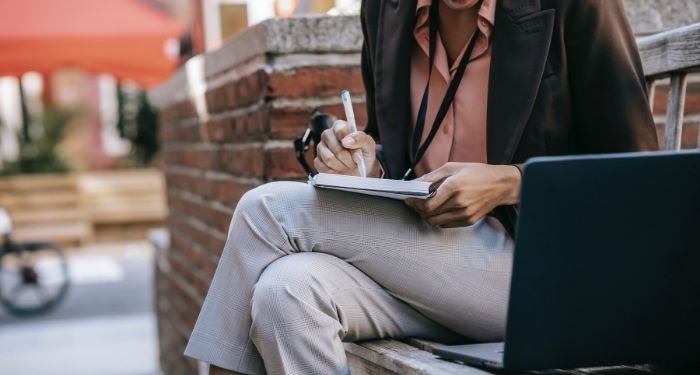 Image of a Black person writing