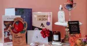 Authentic Books box display: a face mask, the book Transcendent Kingdom, chocolate from Ghana, and other beauty products