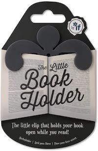 A promotional photo of a book holder that looks like a little man holding open the pages