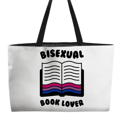 Wide tote bag with black handle and screenprinted illustration of a book with bisexual pride colors and the text "bisexual book lover"