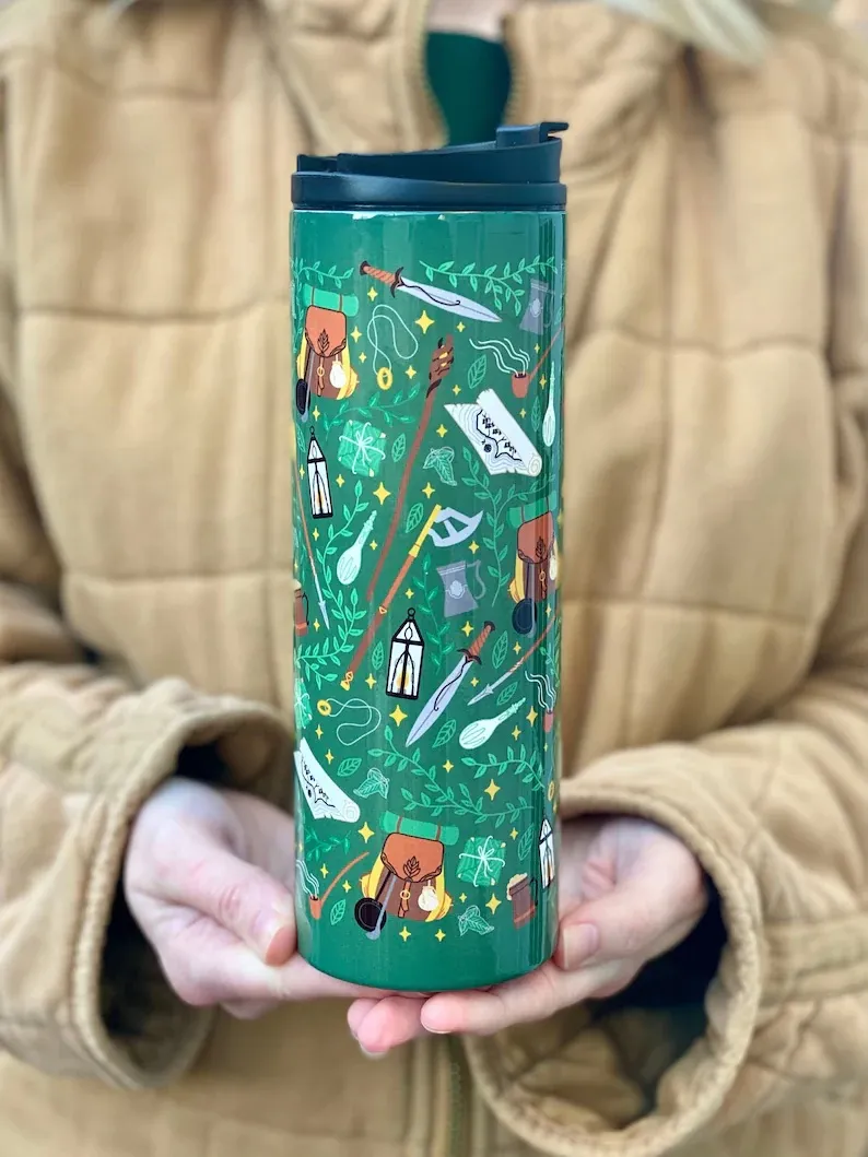 Hands Holding Adventurer's Travel Mug 