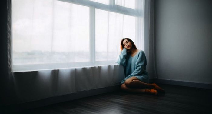 woman sitting by herself