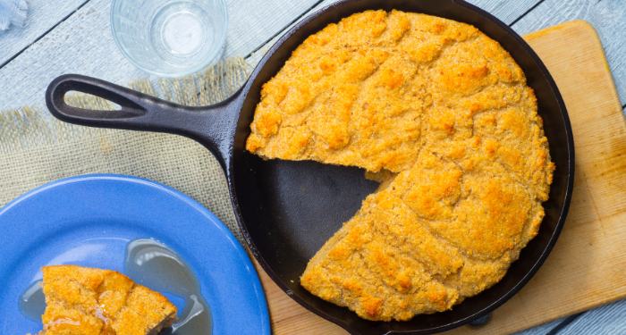 a photo of cornbread in a cast iron skillet