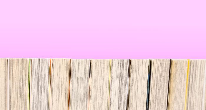 Image of manga pages on pink background