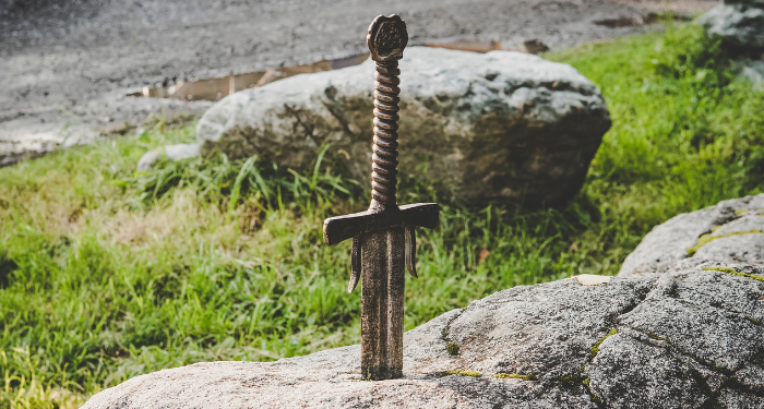 a photo of a sword in a stone