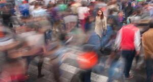 people blurry in a crowd