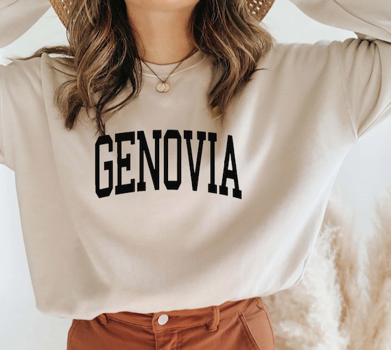 Light-colored sweatshirt reading GENOVIA.