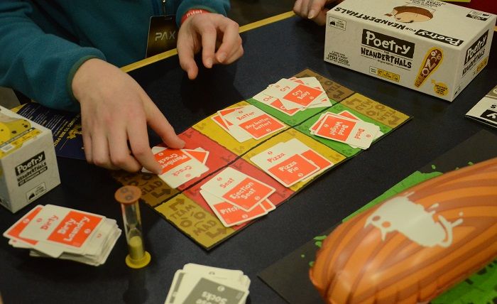 Image of family playing Poetry for Neanderthals by Exploding Kittens