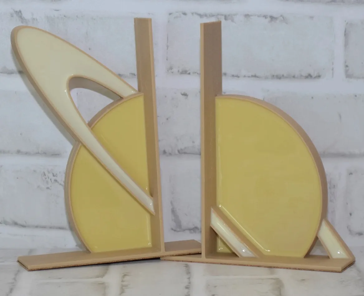 Set of bookends in the shape of Saturn.