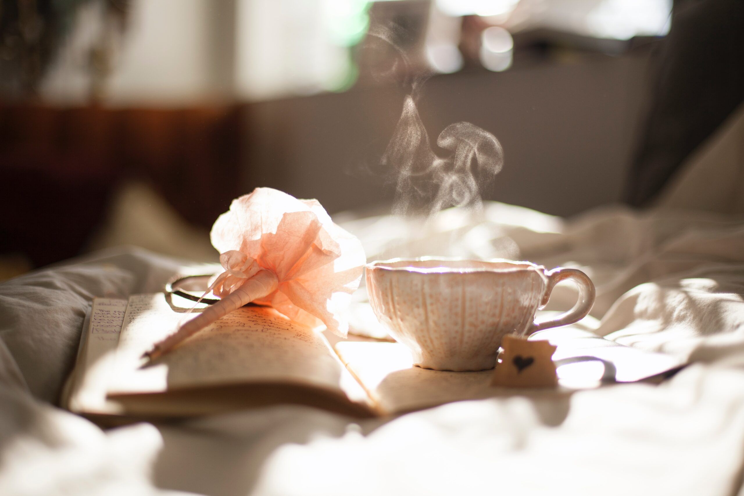 Journal With Pen and Teacup Image