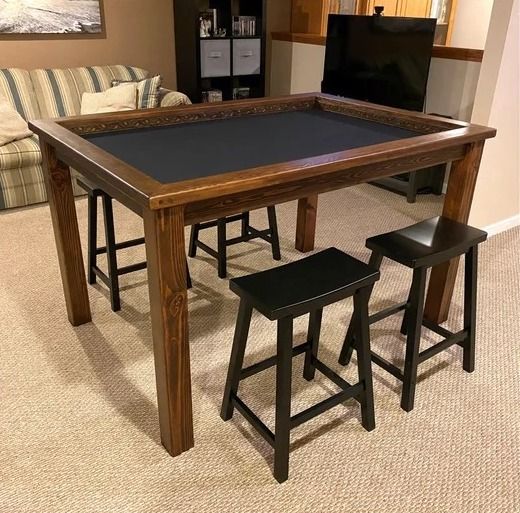 a photo of a wooden gaming table with a recessed vault