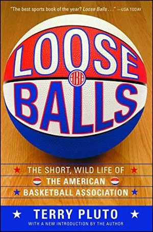 cover of Loose Balls: The Short, Wild Life of the American Basketball Association by Terry Pluto; photo of a red, white, and blue basketball with the title painted on it