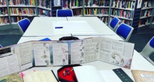 table with D&D material on it at a library