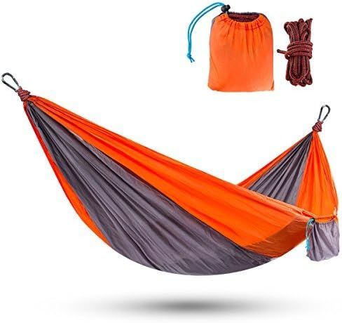 An orange and gray camping hammock shown fully expanded and collapsed into a tiny pouch